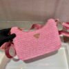 Prada 1BH204 Prada Re-Edition 2005 Raffia Bag in Pink