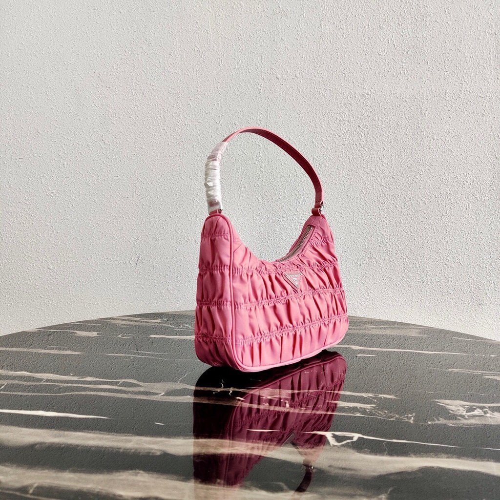 Prada 1NE204 Prada Nylon and Saffiano Leather Mini Bag in Pink
