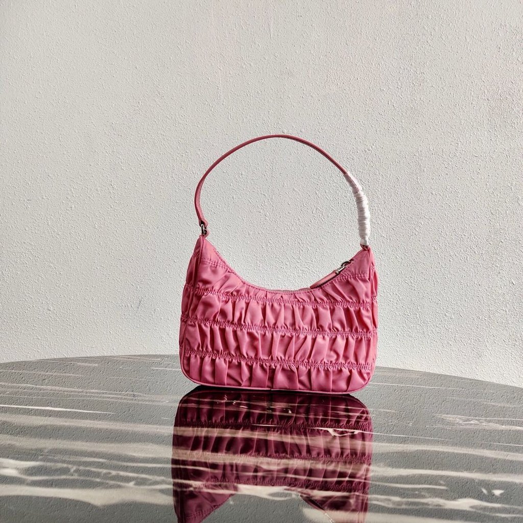Prada 1NE204 Prada Nylon and Saffiano Leather Mini Bag in Pink