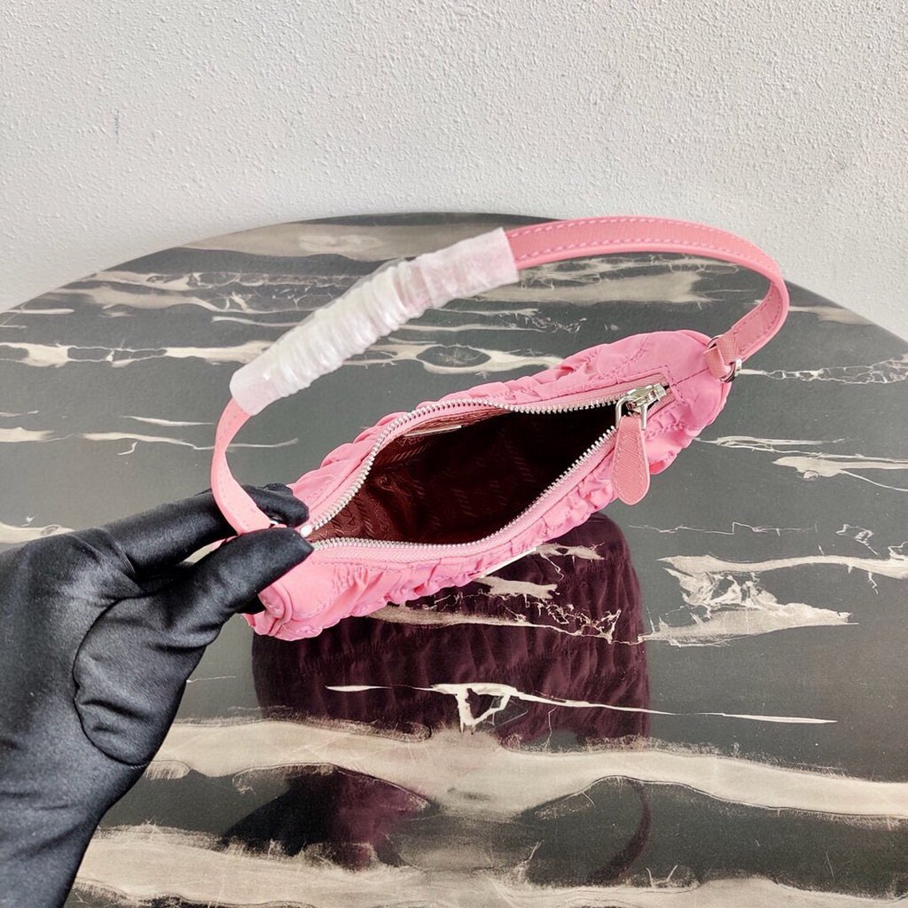 Prada 1NE204 Prada Nylon and Saffiano Leather Mini Bag in Pink