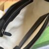 Gucci 674058 GG embossed messenger bag Black