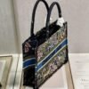 Dior M1296 Medium Book Tote D-Constellation embroidery in shades of blue