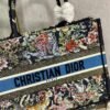 Dior M1296 Medium Book Tote D-Constellation embroidery in shades of blue