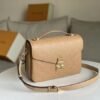 Louis Vuitton Pochette Metis Monogram Empreinte Cream M44738