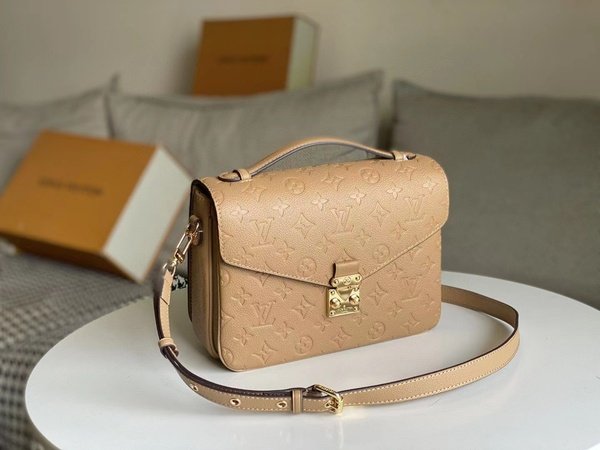Louis Vuitton Pochette Metis Monogram Empreinte Cream M44738