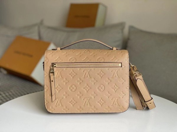 Louis Vuitton Pochette Metis Monogram Empreinte Cream M44738
