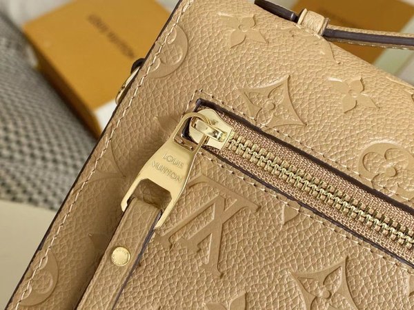 Louis Vuitton Pochette Metis Monogram Empreinte Cream M44738