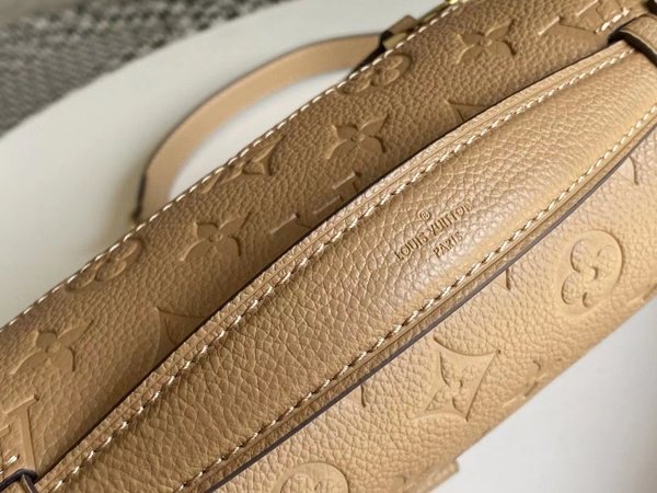 Louis Vuitton Pochette Metis Monogram Empreinte Cream M44738
