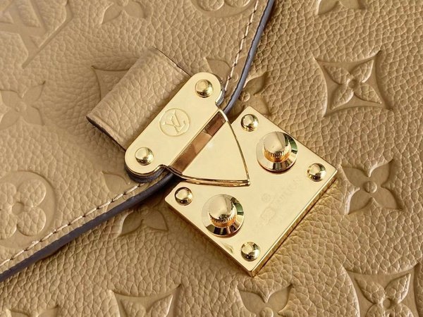 Louis Vuitton Pochette Metis Monogram Empreinte Cream M44738