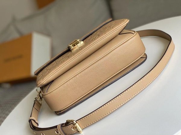 Louis Vuitton Pochette Metis Monogram Empreinte Cream M44738