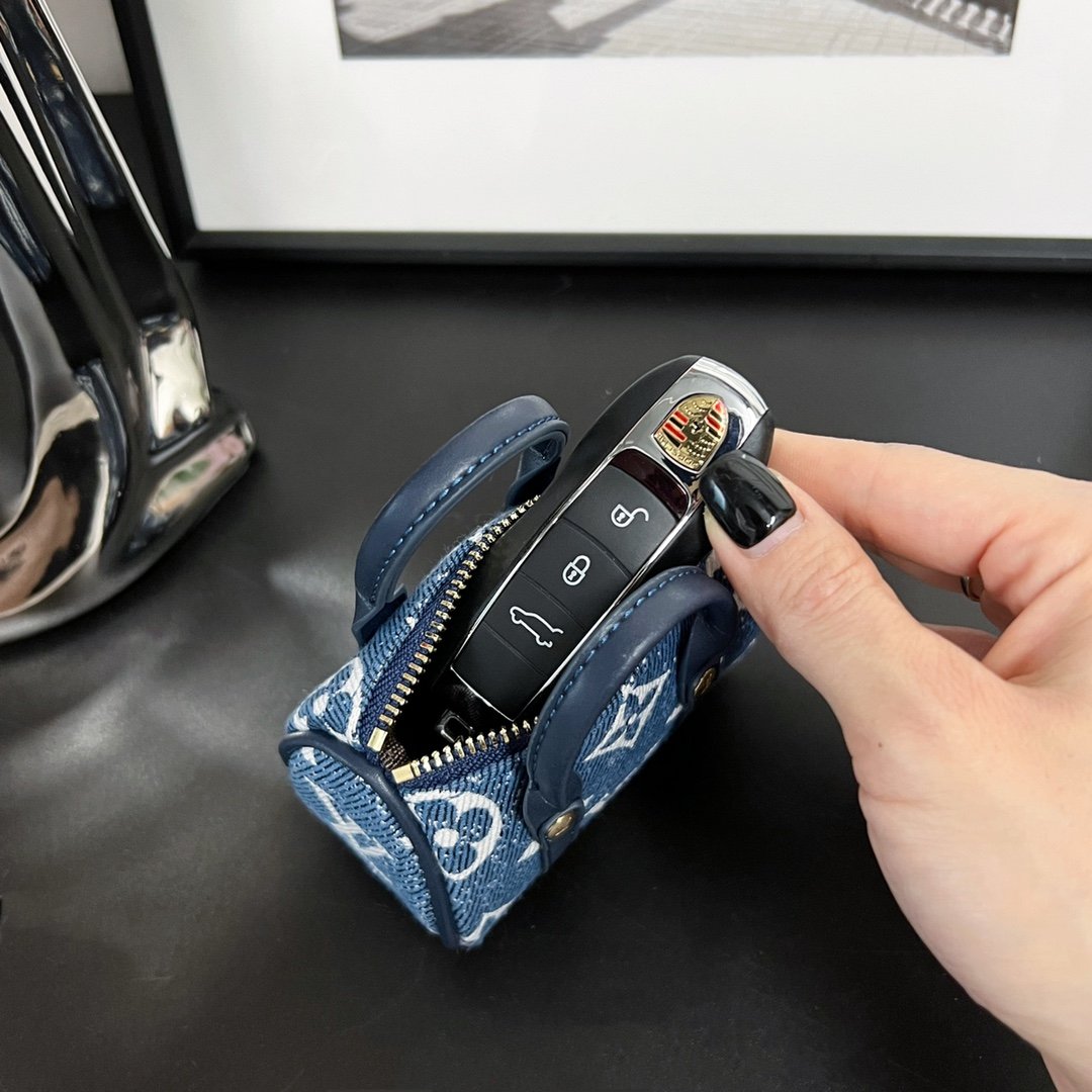 Replica Louis Vuitton MINI KEEPALL  mini pillow bag charm