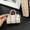 Louis Vuitton MINI KEEPALL  mini pillow bag charm