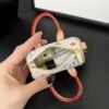 Louis Vuitton MINI KEEPALL  mini pillow bag charm